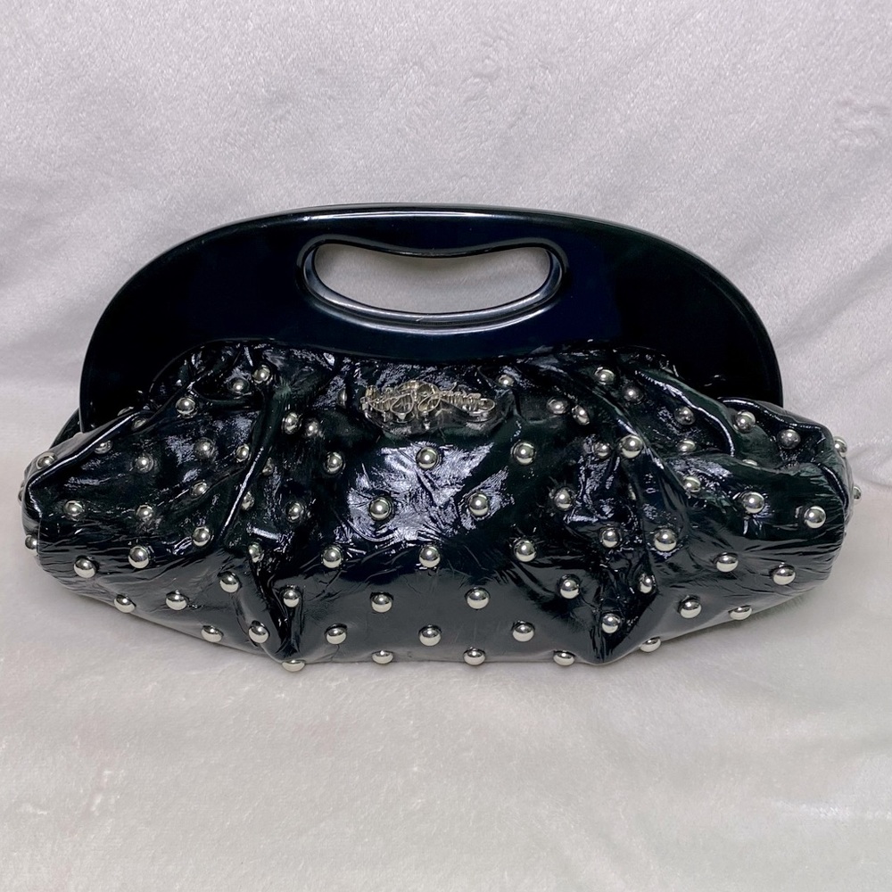 Betsey Johnson purse with silver metal details and faux patent leather